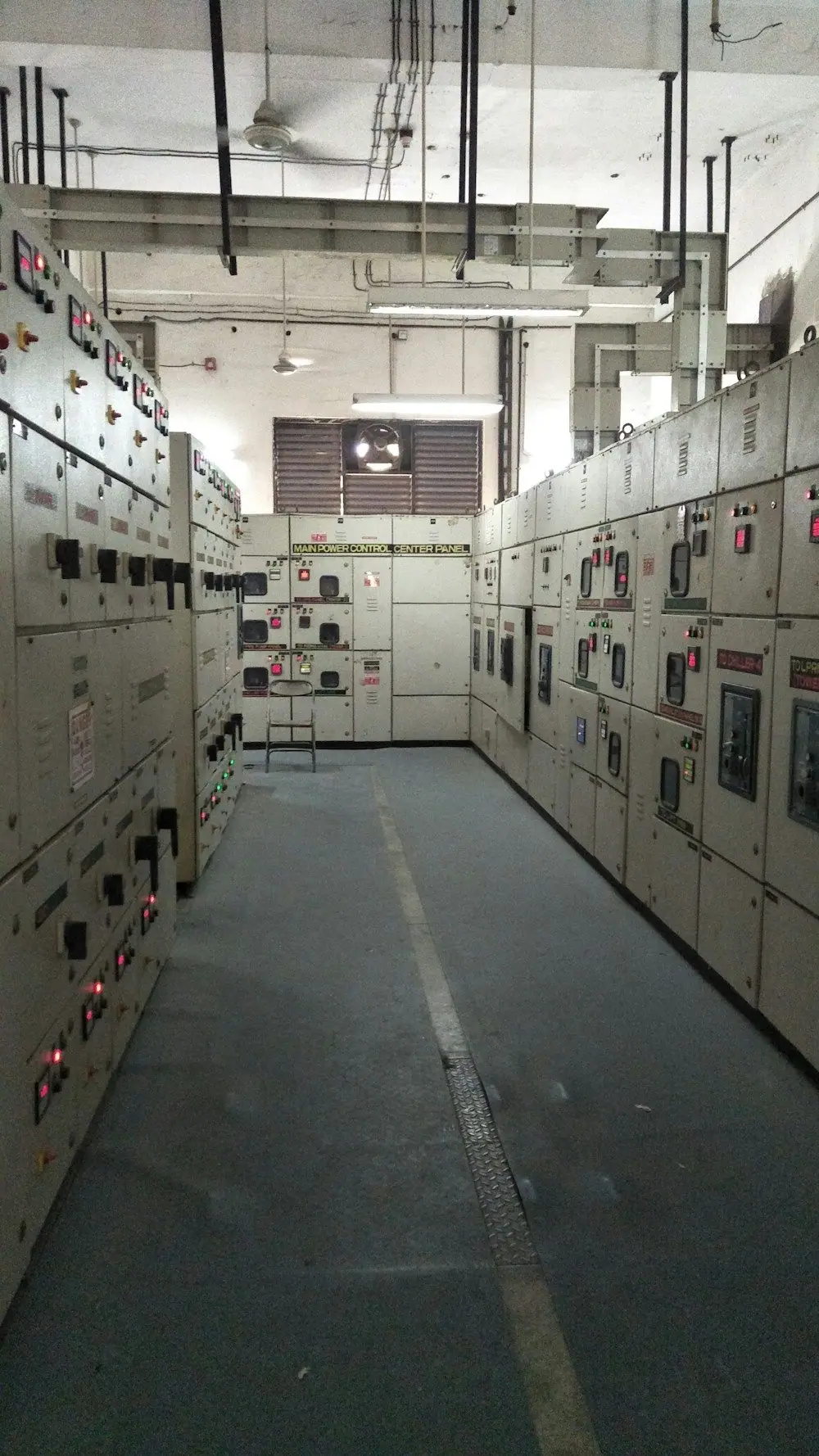 A long hall of switchgear and motor control panels